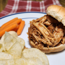 This image has an empty alt attribute; its file name is pulled_pork_NewBanks_sandwich.png